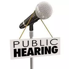 Image of a microphone labeled "public hearing"